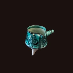 May include: A rustic wooden sign with the text "Welcome to our home" in a handwritten style. The sign features a distressed finish and a simple, inviting design, perfect for entryway decor.