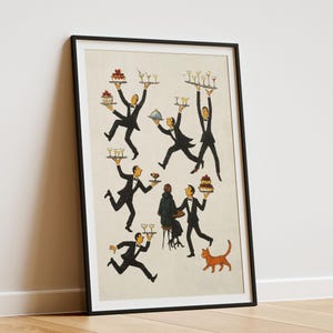 May include: A framed art print featuring a whimsical illustration of several waiters in black tuxedos, each carrying trays of food and drinks. The print includes a cat and a couple seated at a table. The artwork is in a vintage style with a cream-colored background.