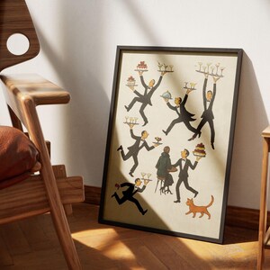 May include: A framed art print featuring a whimsical illustration of several waiters in black suits, each carrying trays of food and drinks. The print has a vintage aesthetic with a warm color palette and a playful, dynamic composition. A cat is also in the image.