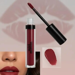 May include: A clear tube of deep red liquid lipstick with a black cap and applicator wand. The tube features the text "miel" printed in black. A separate square swatch shows the dark red color, and a lower section shows the lipstick applied to lips.