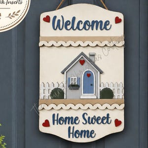 May include: A rectangular wooden door sign featuring the text Welcome and Home Sweet Home in blue script. The sign displays a painted house illustration with a blue door, a white picket fence, and small red hearts at the corners of the panels.