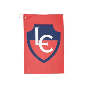 May include: Red golf towel with a navy blue and white shield design. The shield features the white letters "LC". The towel has a small metal ring for hanging.