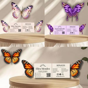 May include: An image showcasing business cards and butterfly illustrations. The cards display names, titles, contact details, and service lists. Butterflies with diverse wing patterns and colors, including purple, orange, and pink, are arranged around the cards.