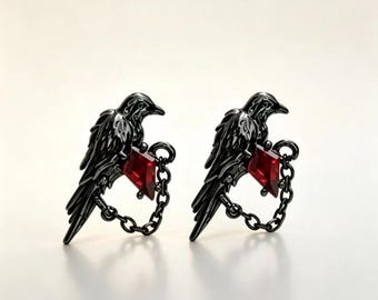 Örhängen med korpröda zirkonkedja, gotiska örhängen med kråka, titanörhängen i implantatkvalitet, helande piercingsmycken