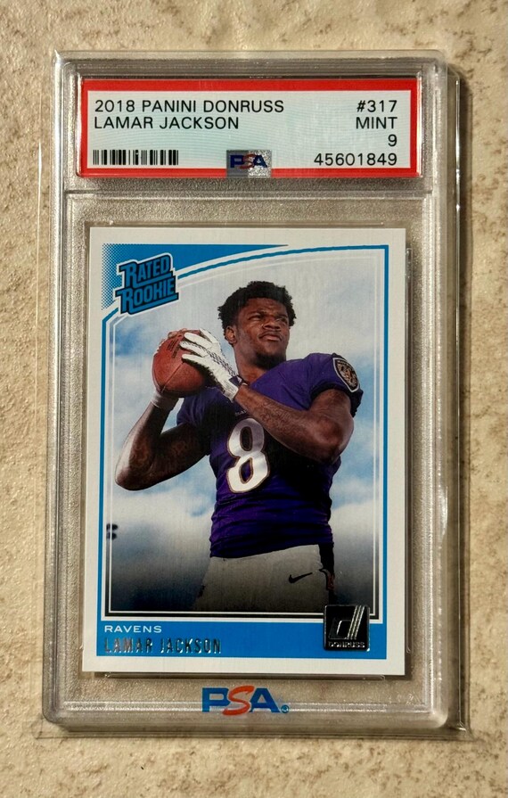 lamar jackson graded card Amazon.com: Lamar Jackson (Baltimore Ravens) 2018 Panini Donruss Football  #317 RC Rookie Card main image 1