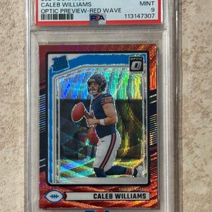 May include: A 2024 Donruss Optic Preview Red Wave Caleb Williams football card, graded Mint 9 by PSA. The card features a player in a Chicago Bears uniform. The card is encased in a protective holder.