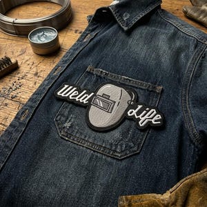 May include: A rustic wooden sign with the text "Welcome to our home" in a handwritten style. The sign features a distressed finish and a simple, inviting design, perfect for a front porch or entryway.