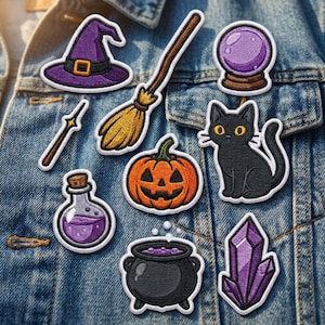 May include: A collection of embroidered patches featuring a purple witch hat, a broomstick, a crystal ball, a wand, a black cat, a jack-o'-lantern, a potion bottle, a black cauldron with purple liquid, and a purple crystal cluster on denim fabric.