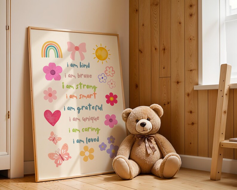 This vibrant digital download features a collection of kids' daily affirmations designed to inspire confidence. The artwork includes uplifting phrases such as "I am kind," "I am brave," and "I am loved," beautifully surrounded by colorful illustrations of flowers, a sun, a rainbow, and butterflies. Perfect for decorating a child's room, playroom, or nursery, creating an uplifting environment that encourages kids to embrace a positive mindset and boosts their self-esteem.