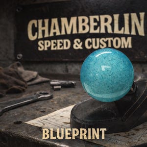 May include: A blue-green sphere with a speckled pattern sits atop a black base. The image features the text "CHAMBERLIN SPEED & CUSTOM" on a dark background, with the word "BLUEPRINT" below. Tools and a wrench are visible.