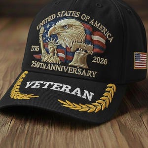 May include: Black baseball cap with embroidered design. Features an eagle, American flag, Statue of Liberty, and Liberty Bell. Text includes "United States of America," "1776," "2026," "250th Anniversary," and "Veteran."