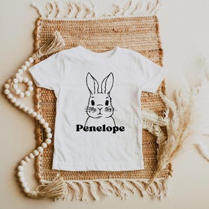 Custom Name Bunny Shirt , Easter shirt, Easter bunny graphic tee, Easter shirts for Kids, Bunny Face Shirt, Kids Easter Shirt