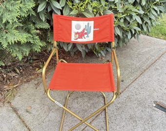 Silla plegable de camping francesa vintage Lafuma color naranja atardecer estilo suroeste