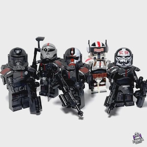 May include: Five custom LEGO minifigures of Star Wars characters. The figures are primarily black with red and white accents, each with unique helmets and weapons. The figures are standing in a row against a white background.