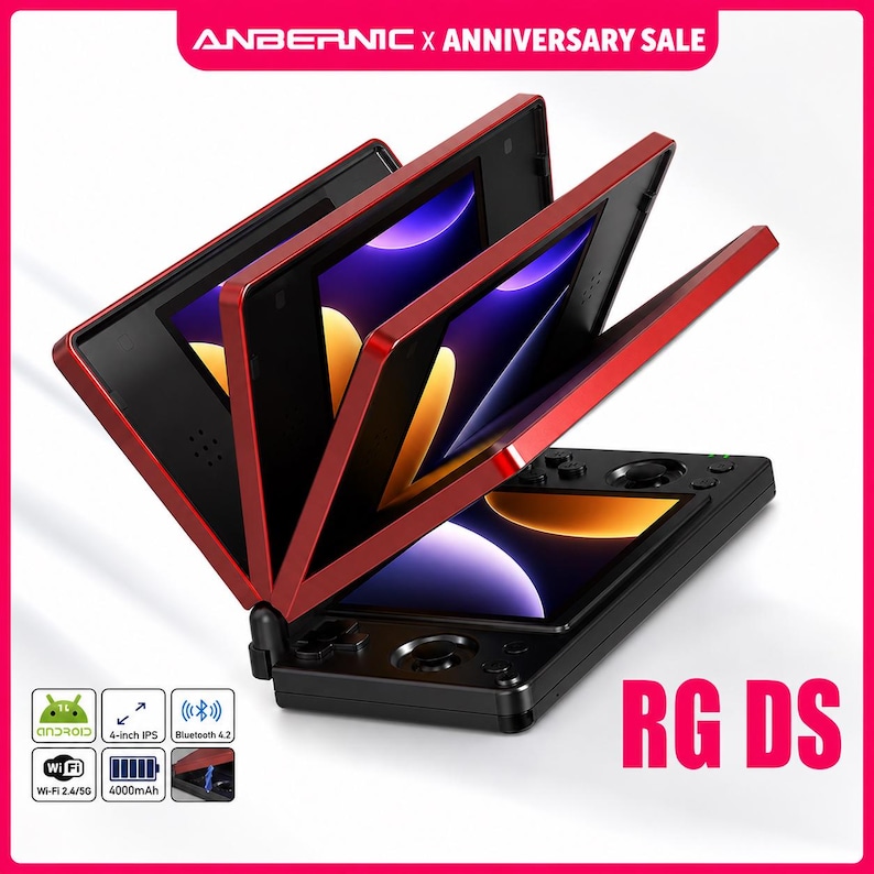 May include: A black and red handheld gaming console with a clamshell design. The screen displays a colourful graphic. The console has buttons and a joystick. The text "RG DS" is visible. The image also includes the text "ANBERNIC X ANNIVERSARY SALE".