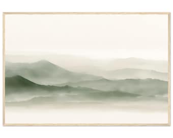 May include: A framed landscape wall art print featuring a watercolor painting of layered mountain ranges in shades of sage green and soft beige. The artwork displays a misty, atmospheric effect with overlapping hills fading into the horizon.