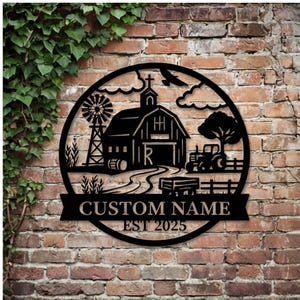 May include: A circular black metal wall sign featuring a farm scene with a barn, windmill, tractor, and tree. The design includes a banner at the bottom with the text CUSTOM NAME and EST 2025, along with a letter R centered on the barn door.