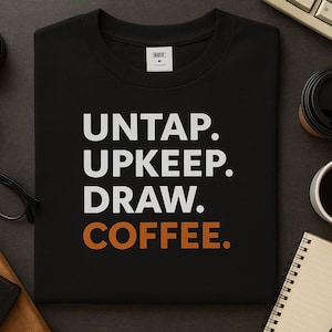 May include: Black crew neck sweatshirt with the words "UNTAP. UPKEEP. DRAW. COFFEE." in white and orange. The image includes coffee beans, a cup of coffee, a notepad, glasses, and a keyboard.