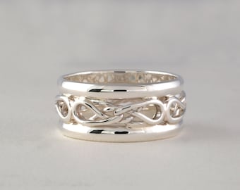 Anillo con nudo celta de amor eterno y rieles