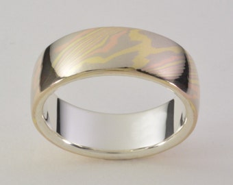 Mokume Gane Band Trigold, Wide: 18K Palladium White, Red/Rose, and Yellow Gold Mokume Gane, with a Sterling Silver Liner. Mokume Gane Ring