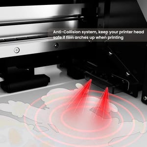 May include: A close-up of a printer's internal components, featuring a silver and black design. The image highlights the anti-collision system, with text indicating its function to protect the printer head. Red light beams emanate from the printer.
