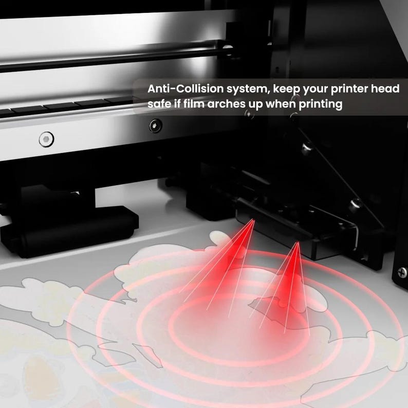 May include: A close-up of a printer's internal components, featuring a silver and black design. The image highlights the anti-collision system, with text indicating its function to protect the printer head. Red light beams emanate from the printer.