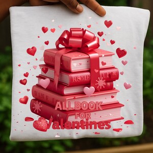 May include: White square pillow with a Valentine's Day design. A stack of red books is tied with a red ribbon and bow. The books have the words "ROME" and "TUT'S" on the spines. The text "ALL BOOK FOR Valentines" is printed on the bottom book. Red and pink hearts are scattered around the books.