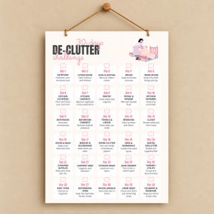 May include: A 30-day declutter challenge wall chart featuring a grid of thirty numbered boxes with daily tasks. The white poster has black and pink text, a hanging rope at the top, and an illustration of a person organizing a bed.