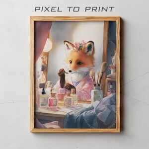 May include: A framed watercolor print featuring a fox in a pink robe applying makeup at a vanity. The fox is reflected in a mirror, surrounded by perfume bottles and makeup brushes. The text "PIXEL TO PRINT" is at the top.