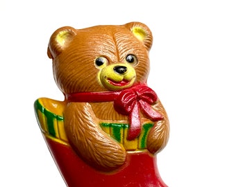 vintage teddy bear lapel pin, teddy bear in Christmas stocking, plastic brooch