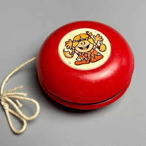 vintage red plastic children’s yo-yo, vintage toy