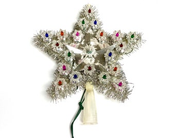 vintage silver star Christmas tree topper, multicolored lights, silver tinsel