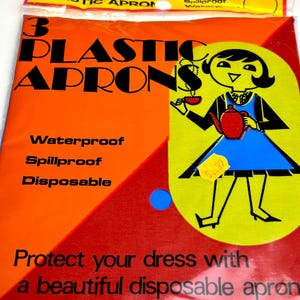 May include: A package of three plastic aprons. The packaging is orange and red with the words "3 PLASTIC APRONS" in large black letters. The aprons are waterproof, spillproof, and disposable. The package features a cartoon illustration of a woman in a blue dress.