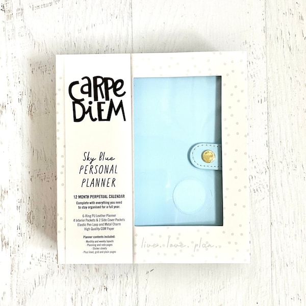 Carpe Diem Personal Planner Boxed Set, Sky Blue, White & Gold, 6 ring simulated leather, 4 interior/ 2 side pockets, pen loop, metal charm