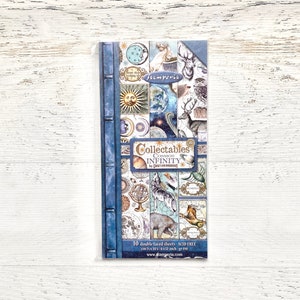 May include: A pack of 10 double-sided sheets of decorative paper featuring a celestial theme. The paper is acid-free and measures 6x12 inches. The pack is blue with the text "Collectables Cosmos Infinity by Christian  Jacobsen" and "Stamperia" printed on it.