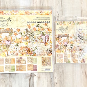Könnte beinhalten: Ein Pack mit 30,5 x 30,5 cm großen Scrapbooking-Papier mit Herbstthema mit Kürbissen, Blättern und Sonnenblumen. Das Papierpack ist von Graphic 45 und trägt den Titel "Hello Pumpkin".
