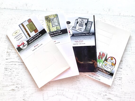 The Paper Cut pre-cut card pack of 25, A2, scallop rectangle swinging z-fold (white or ivory), Horizontal Center Step, or Outer Stair Step