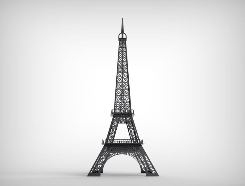 Pode incluir: Um modelo preto da Torre Eiffel sobre um fundo branco. A torre &eacute; uma r&eacute;plica detalhada, mostrando sua intrincada estrutura de treli&ccedil;a, base de arco e pin&aacute;culo. &Eacute; uma lembran&ccedil;a ou um item decorativo.