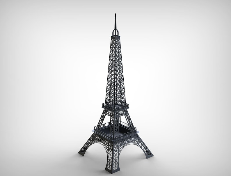 Pode incluir: Um modelo cinza escuro da Torre Eiffel. A torre &eacute; uma r&eacute;plica detalhada do ic&oacute;nico monumento parisiense, com intrincados trabalhos de treli&ccedil;a e uma agulha pontiaguda. O modelo est&aacute; sobre um fundo branco.