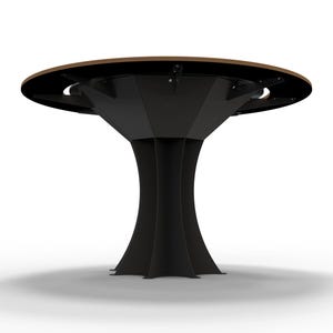 May include: A modern, round table with a dark brown tabletop and a black, geometric base. The base has a unique, tree-like design with multiple curved legs. The table is set against a white background.