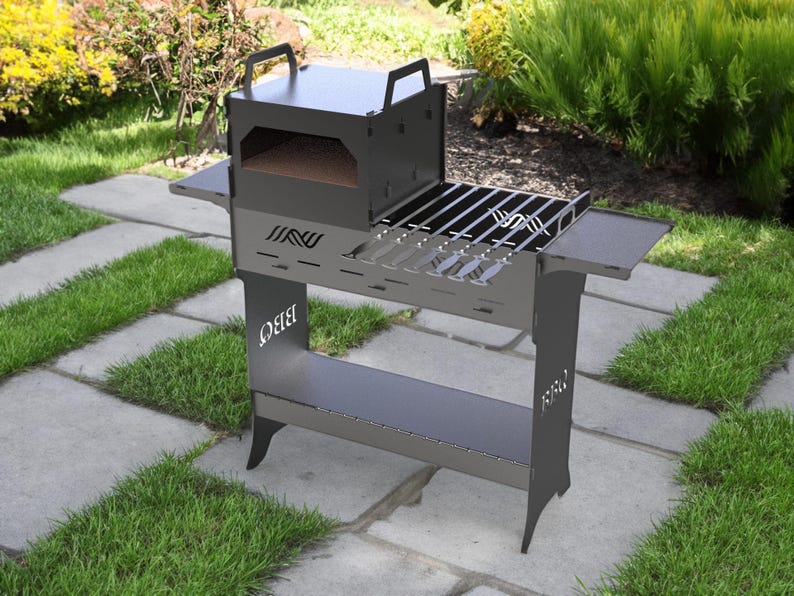 May include: A dark gray outdoor grill with a pizza oven, side shelves, and a lower storage shelf. The grill has a metal grate and the word "BBQ" is cut out on the side. The grill is on a stone patio with grass.