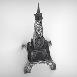 Pode incluir: Modelo da Torre Eiffel em tons de cinza. O monumento ic&oacute;nico &eacute; representado com detalhes arquitet&oacute;nicos precisos. A torre, com a sua estrutura de treli&ccedil;a e agulha, destaca-se num fundo branco liso.