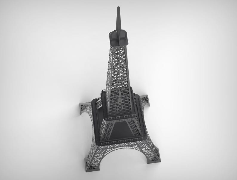 Pode incluir: Modelo da Torre Eiffel em tons de cinza. O monumento ic&oacute;nico &eacute; representado com detalhes arquitet&oacute;nicos precisos. A torre, com a sua estrutura de treli&ccedil;a e agulha, destaca-se num fundo branco liso.