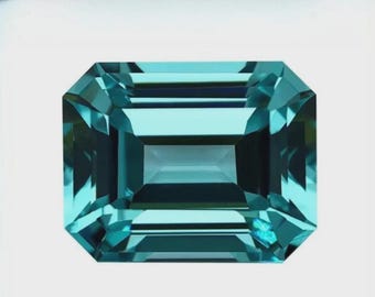 May include: Emerald-cut gemstone with a teal color. The gem has a rectangular shape with beveled edges and facets that reflect light. The gemstone is set against a white background.