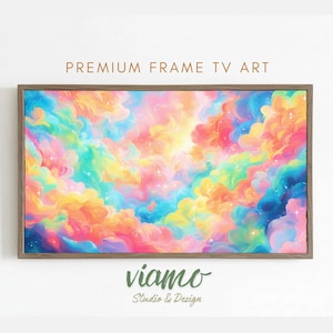 Pode incluir: Uma obra de arte emoldurada com um design abstrato colorido. A obra apresenta uma mistura rodopiante de tons rosa, amarelo, laranja, azul e verde, assemelhando-se a uma paisagem de nuvens sonhadora. A moldura é de cor castanho claro, e o texto "PREMIUM FRAME TV ART" está no topo.