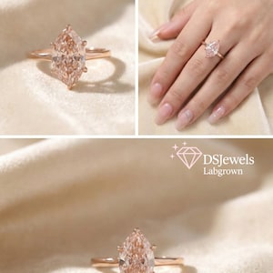 May include: Rose gold ring with a marquise-cut, light pink gemstone. The ring is displayed on a cream-colored surface and also worn on a hand. The image includes the text "DSJewels Labgrown".