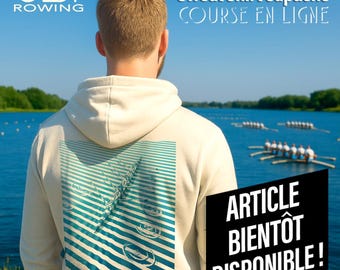 May include: Cream-colored hoodie with a blue and white graphic on the back, featuring a rowing boat design and the text "COURSE EN LIGNE". The hoodie also has the text "ARTICLE BIENTÔT DISPONIBLE!" on a black sign.