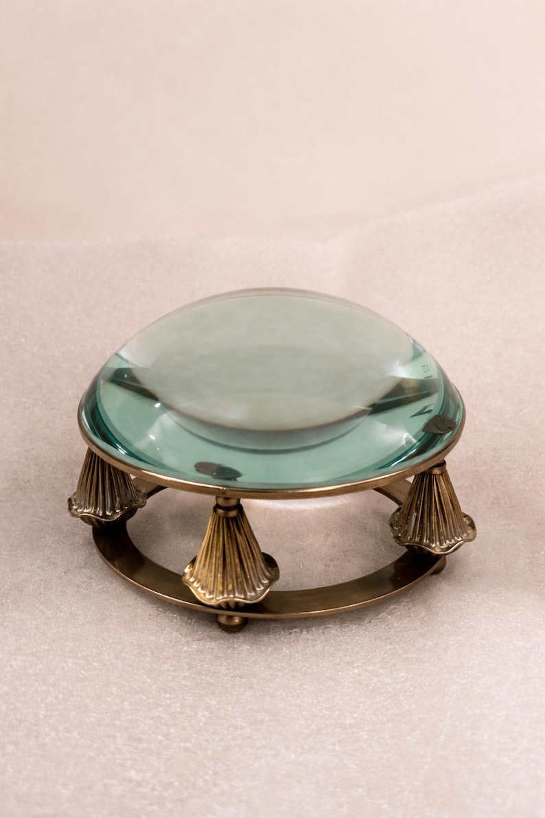 May include: A set of three ceramic nesting bowls in shades of blue, green, and white. The bowls feature a speckled glaze and a simple, modern design. The largest bowl measures approximately 6 inches in diameter.
