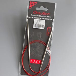 May include: A packet of ChiaoGoo SS Red Lace Circular knitting needles. The needles are stainless steel, US size 7 (4.5 mm), and 80 cm long. The package has the word "LACE" printed on it.
