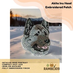 May include: Embroidered patch featuring a detailed portrait of an Akita Inu dog's head. The patch has an iron-on backing and a fully embroidered finish. The text on the patch reads: Akita Inu Head Embroidered Patch, -DETAILED HEAD PORTRAIT, -COMPACT EASY SIZE, -IRON-ON BACKING, -FULLY EMBROIDERED FINISH, RAMBE309.